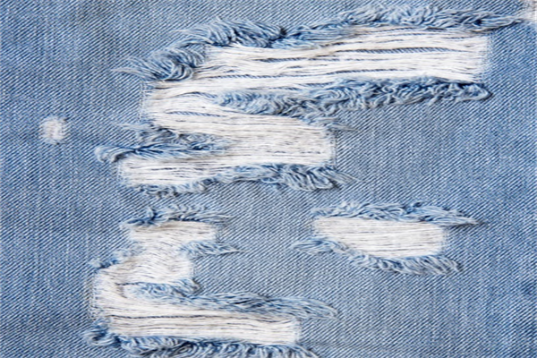 Innovative Denim Garment Grinding And Tearing Methods For Brands-3