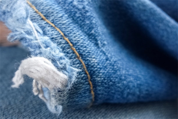 The Best Distressed Denim Jackets for a Layered Winter Look