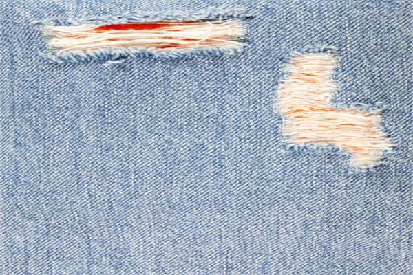 The Ultimate Guide to Styling Distressed Denim with Sneakers