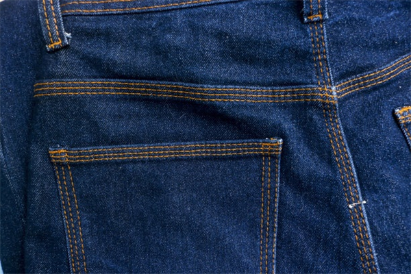 Custom Denim Fraying And Destroying Processes For Designer Apparel
