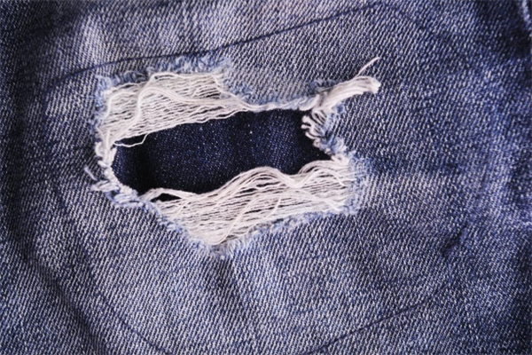 How to Pair Your Ripped Denim with Elegant Tops for Contrast