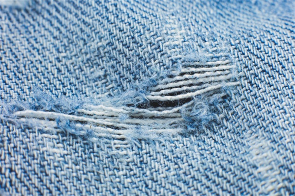 How to Wear Distressed Denim Overalls for a Playful Outfit