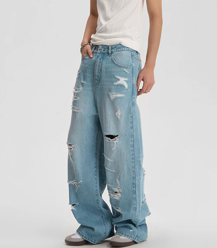 Men's Vintage Light Blue Jeans with Artistic Rips
