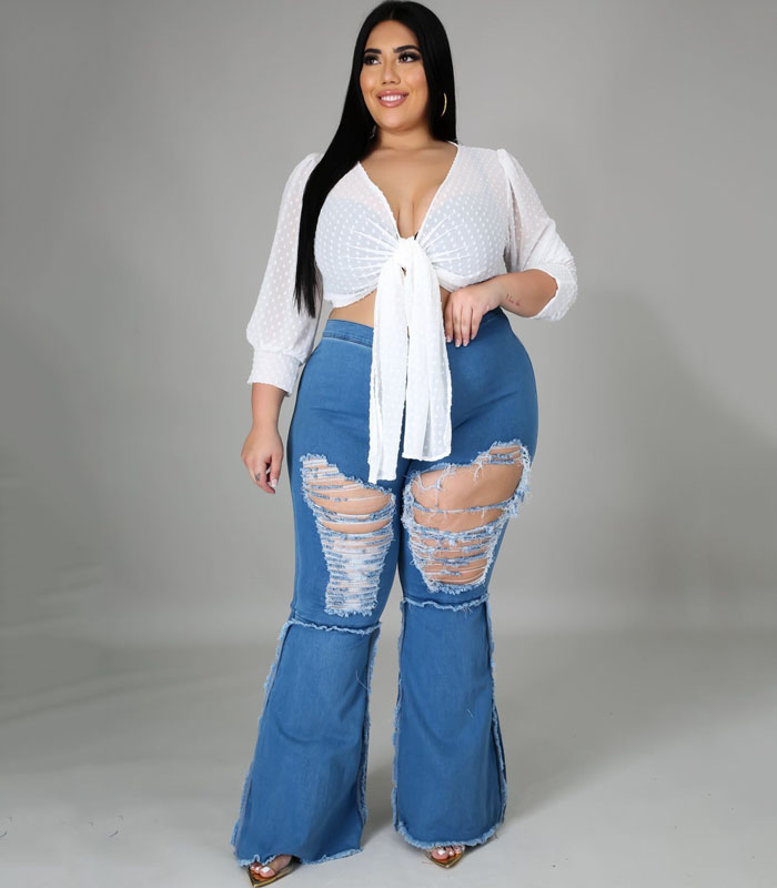 Sexy High-Rise Flared Jeans in Dark Blue Washed Denim with Distressed Details & Raw Hem
