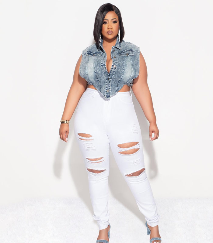 Oversized white distressed jeans