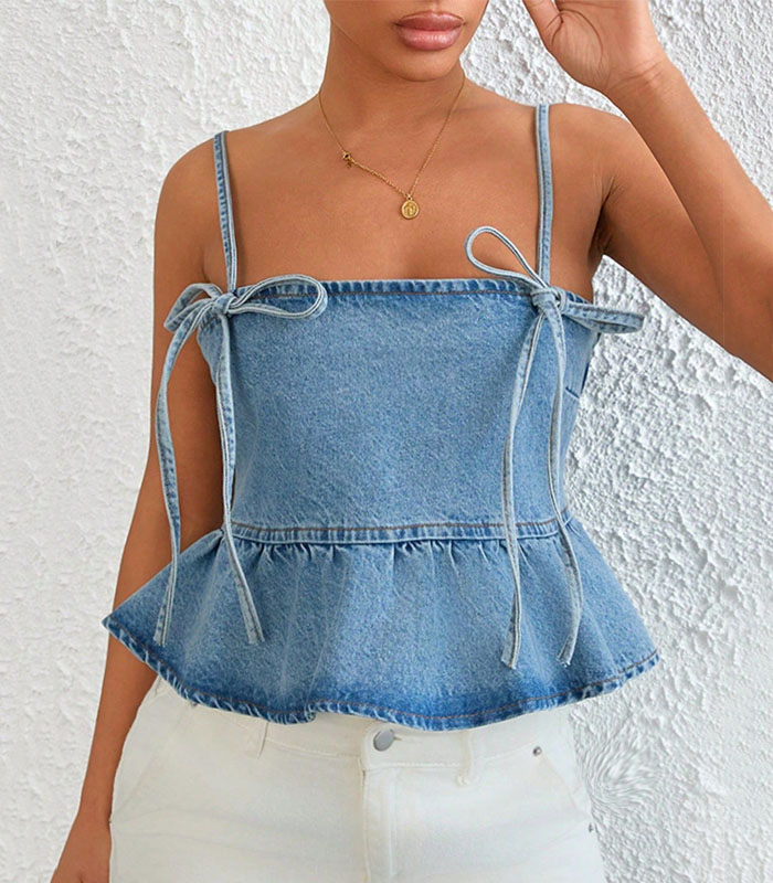 Sweet strappy tie-up light-wash denim top with a ruffle hem